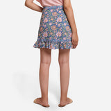 Back View of a Model wearing Blue Cotton Floral Button-Down Skirt