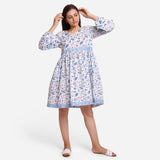 Front View of a Model wearing Blue Floral Fit and Flare Cotton Dress