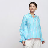 Front View of a Model wearing Blue Hand Tie Dyed Shirred Blouson Top