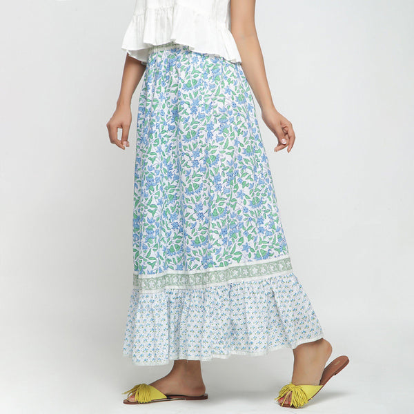 Left View of a Model wearing Blue Printed Flowy Paneled Skirt