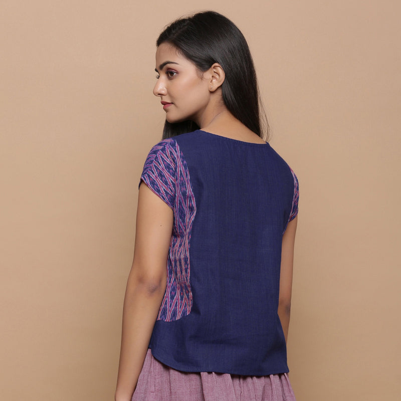 Back View of a Model wearing Blue Ikat Paneled Handspun Straight Top