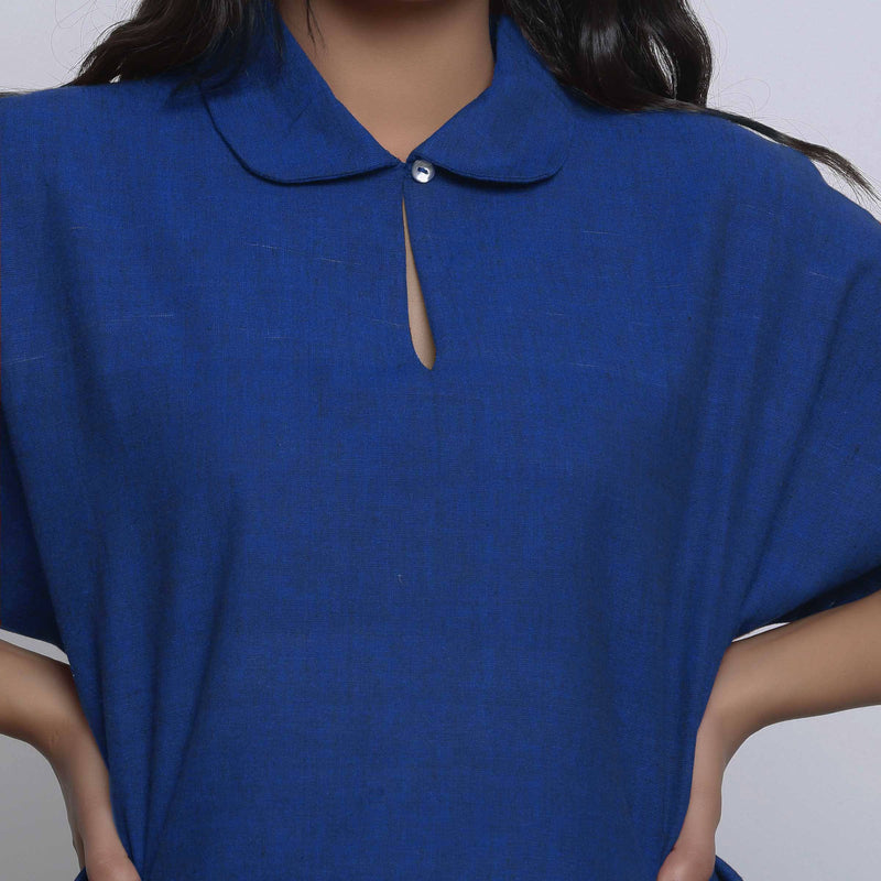 Front Detail of a Model wearing Blue Round Collar Straight Top