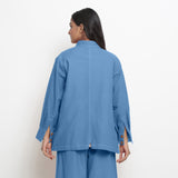 Back View of a Model wearing Blue Vegetable Dyed Button-Down Outerwear