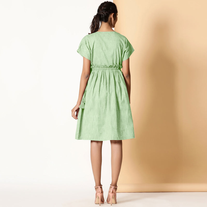 Back View of a Model wearing Bohemian Cotton Light Green Frilled Dress