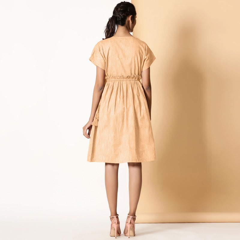 Back View of a Model wearing Bohemian Cotton Yellow Frilled Dress