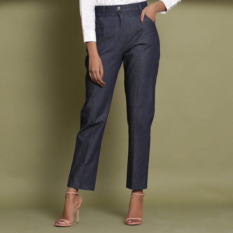 Front View of a Model wearing Indigo Cotton Denim Tapered Jeans