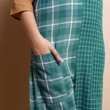 Close View of a Model wearing Bottle Green Cotton Ankle-Length Dungaree