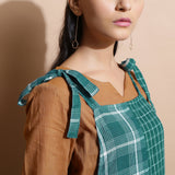 Front Detail of a Model wearing Bottle Green Cotton Ankle-Length Dungaree