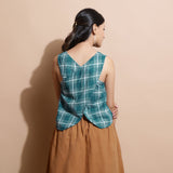 Back View of a Model wearing Bottle Green Cotton Sleeveless Top