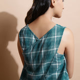 Back Detail of a Model wearing Bottle Green Cotton Sleeveless Top