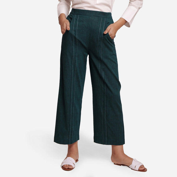 Front View of a Model wearing Bottle Green Mid-Rise Straight Fit Pant