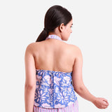 Back View of a Model wearing Blue Floral Halter Neck Short Top