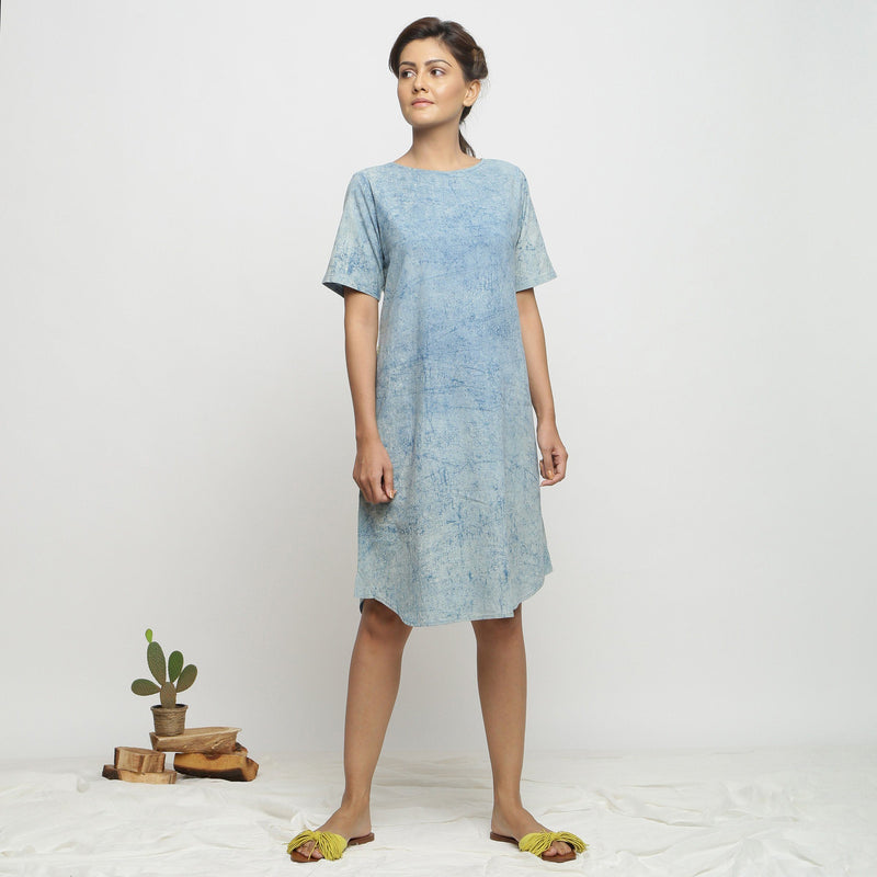 Front View of a Model wearing Blue Dabu Print Hand Embroidered Dress