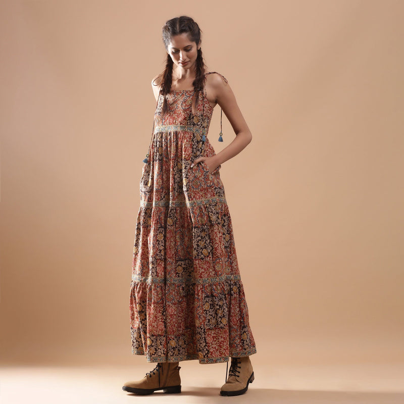 Left View of a Model wearing Bohemian Kalamkari Tiered Cotton Dress