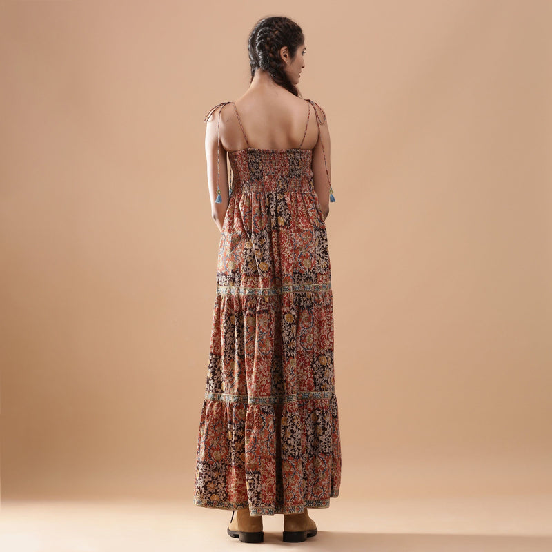 Back View of a Model wearing Bohemian Kalamkari Tiered Cotton Dress