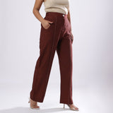 Right View of a Model wearing Breezy Brown Straight Fit Cotton Pant