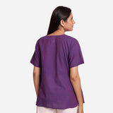 Back View of a Model wearing Breezy Violet Round Neck Flared Top