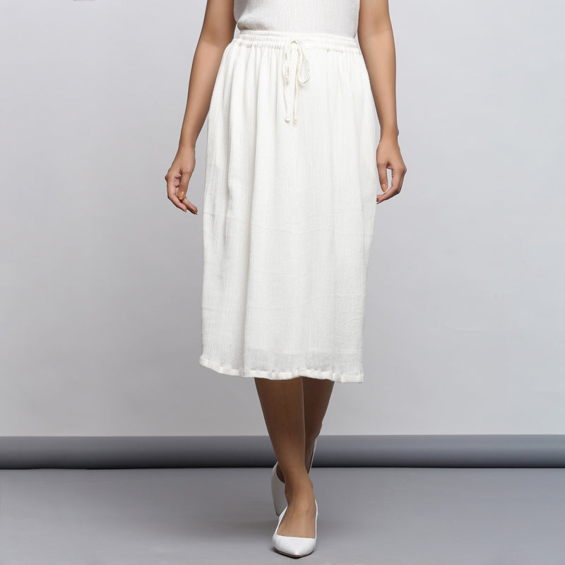 Front View of a Model wearing Off-White Crinkled Cotton Flared Skirt
