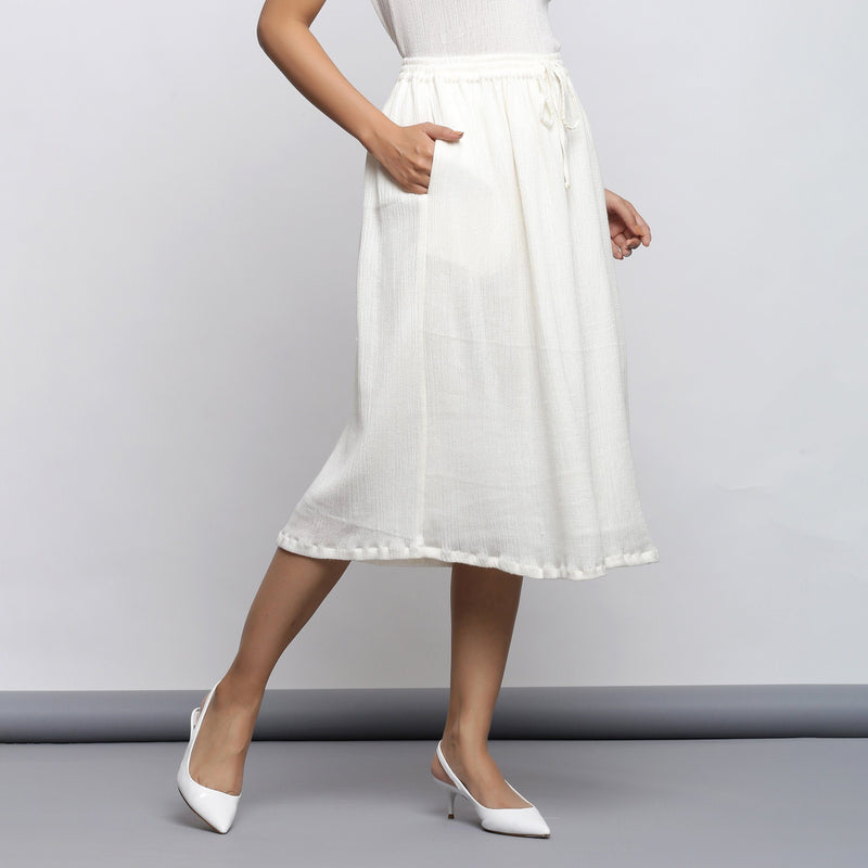 Right View of a Model wearing Off-White Crinkled Cotton Flared Skirt