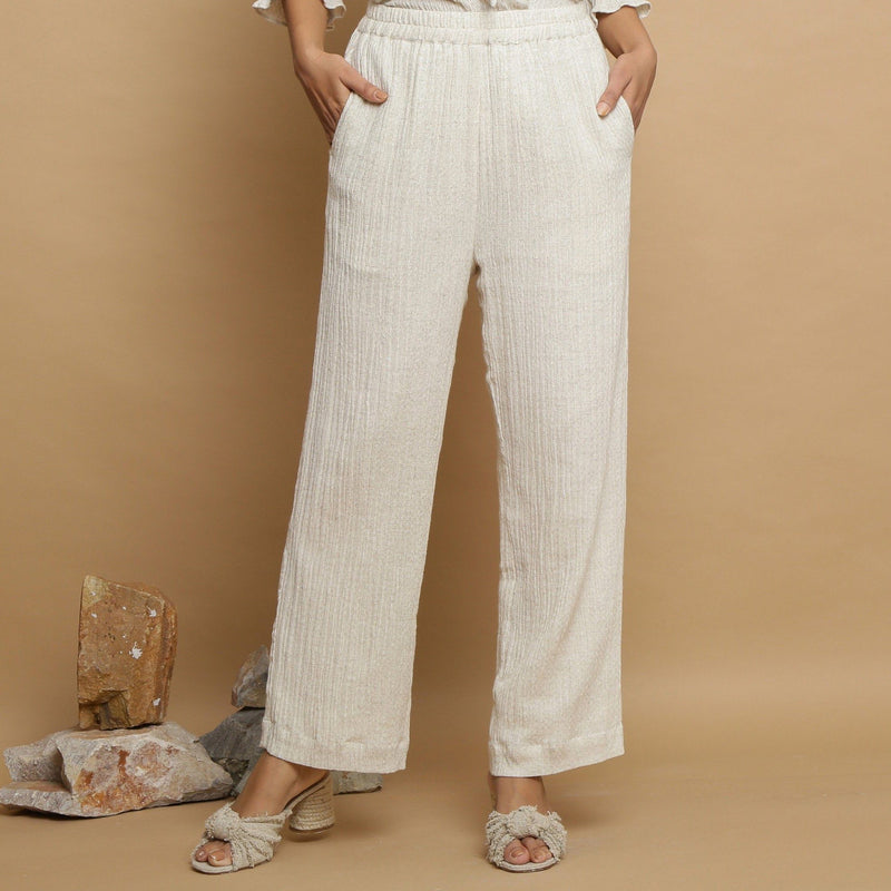 Front View of a Model wearing Undyed Elasticated Mid Rise Ecru Pant