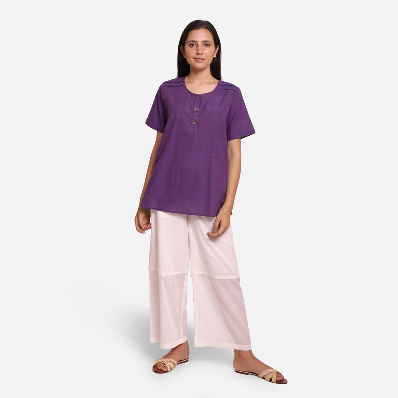 Front View of a Model wearing Breezy Violet Round Neck Flared Top