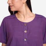 Front Detail of a Model wearing Breezy Violet Round Neck Flared Top