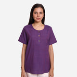 Front View of a Model wearing Breezy Violet Round Neck Flared Top