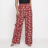 Front View of a Model wearing Brick Red Block Print Wide Straight Cotton Pant