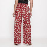 Back View of a Model wearing Brick Red Block Print Wide Legged Pant