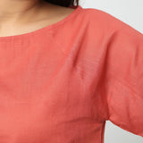 Front Detail of a Model wearing Brick Red Boat Neck Half Sleeve Cotton Top