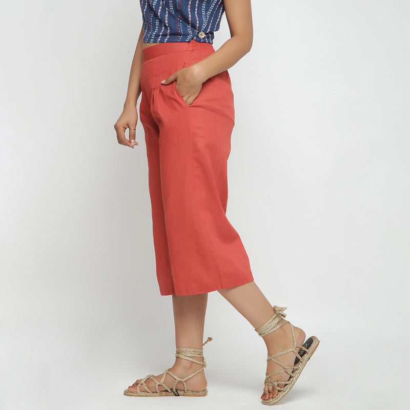 Left View of a Model wearing Brick Red 100% Cotton High-Rise Culottes