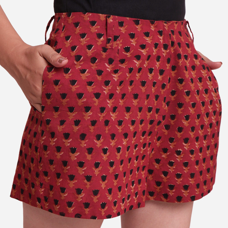 Front Detail of a Model wearing Brick Red Block Print Floral Hot Pants