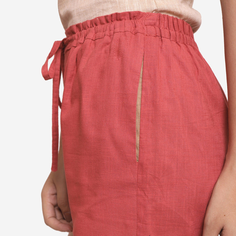 Left Detail of a Model wearing Brick Red Cotton Straight Shorts