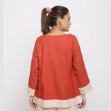 Back View of a Model wearing Brick Red Vegetable Dyed Handspun Cotton A-Line Top