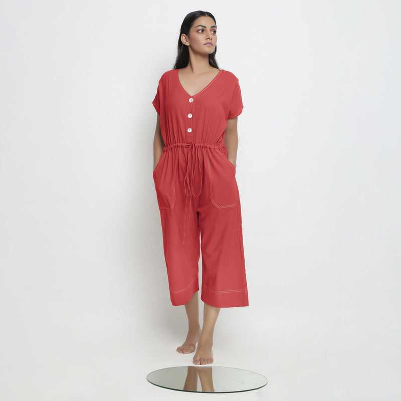 Front View of a Model wearing Brick Red Vegetable Dyed Button-Down Jumpsuit