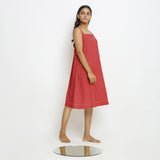 Right View of a Model wearing Brick Red Vegetable Dyed Handspun Slip Dress