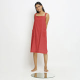 Front View of a Model wearing Brick Red Vegetable Dyed Handspun Slip Dress