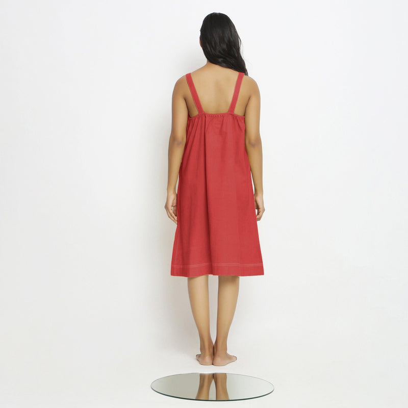 Back View of a Model wearing Brick Red Vegetable Dyed Handspun Slip Dress