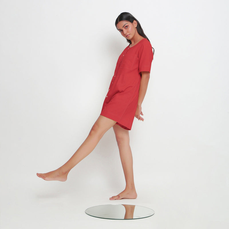 Left View of a Model wearing Brick Red Vegetable Dyed Romper