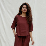 Front View of a Model wearing Brown 100% Cotton Drop Shoulder Sleeves Gathered Top