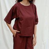 Front Detail of a Model wearing Brown 100% Cotton Drop Shoulder Sleeves Gathered Top