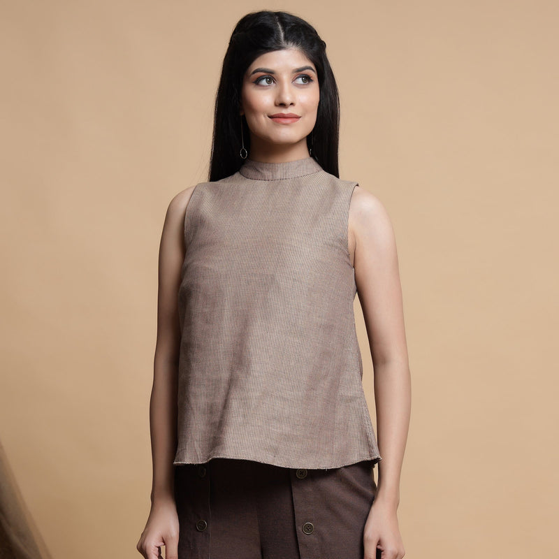 Front View of a Model wearing Brown and Beige Reversible Cotton Yoked Tie-Up Neck Top