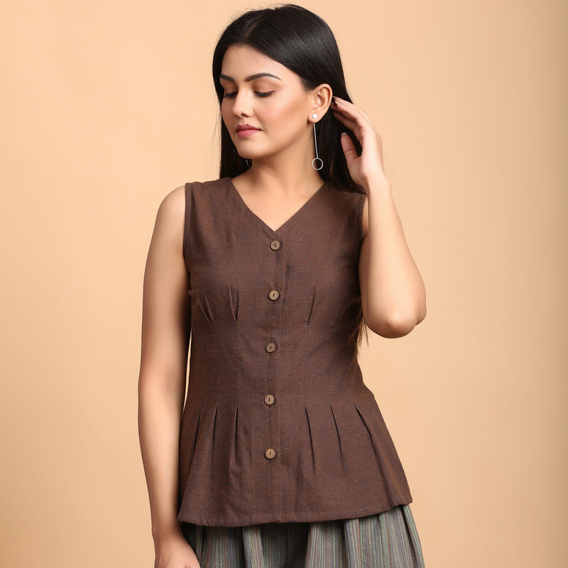 Front View of a Model wearing Brown Button Down Pleated Top