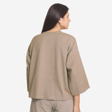 Back View of a Model wearing Beige Cotton Flax Round Neck Loose Fit A-Line Top