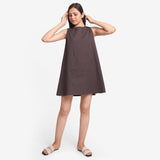Front View Of a Model wearing Brown Cotton Flax Kangaroo Pocket Dress
