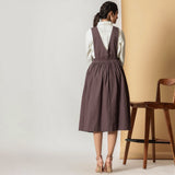 Back View of a Model wearing Brown Cotton Flax Pinafore Midi Wrap Dress