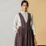 Front View of a Model wearing Brown Cotton Flax Pinafore Midi Wrap Dress