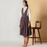 Left View of a Model wearing Brown Cotton Flax Pinafore Midi Wrap Dress