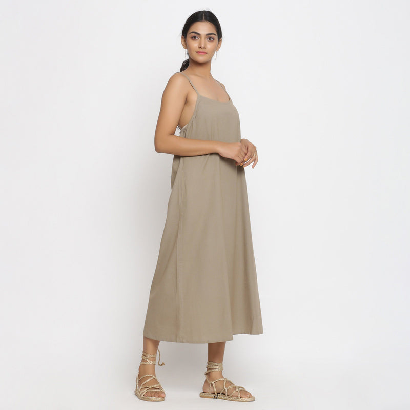 Right View of a Model wearing Brown Cotton Flax Strap Sleeve A-Line Dress