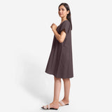 Left View of a Model wearing Brown Cotton Flax V-Neck Tunic